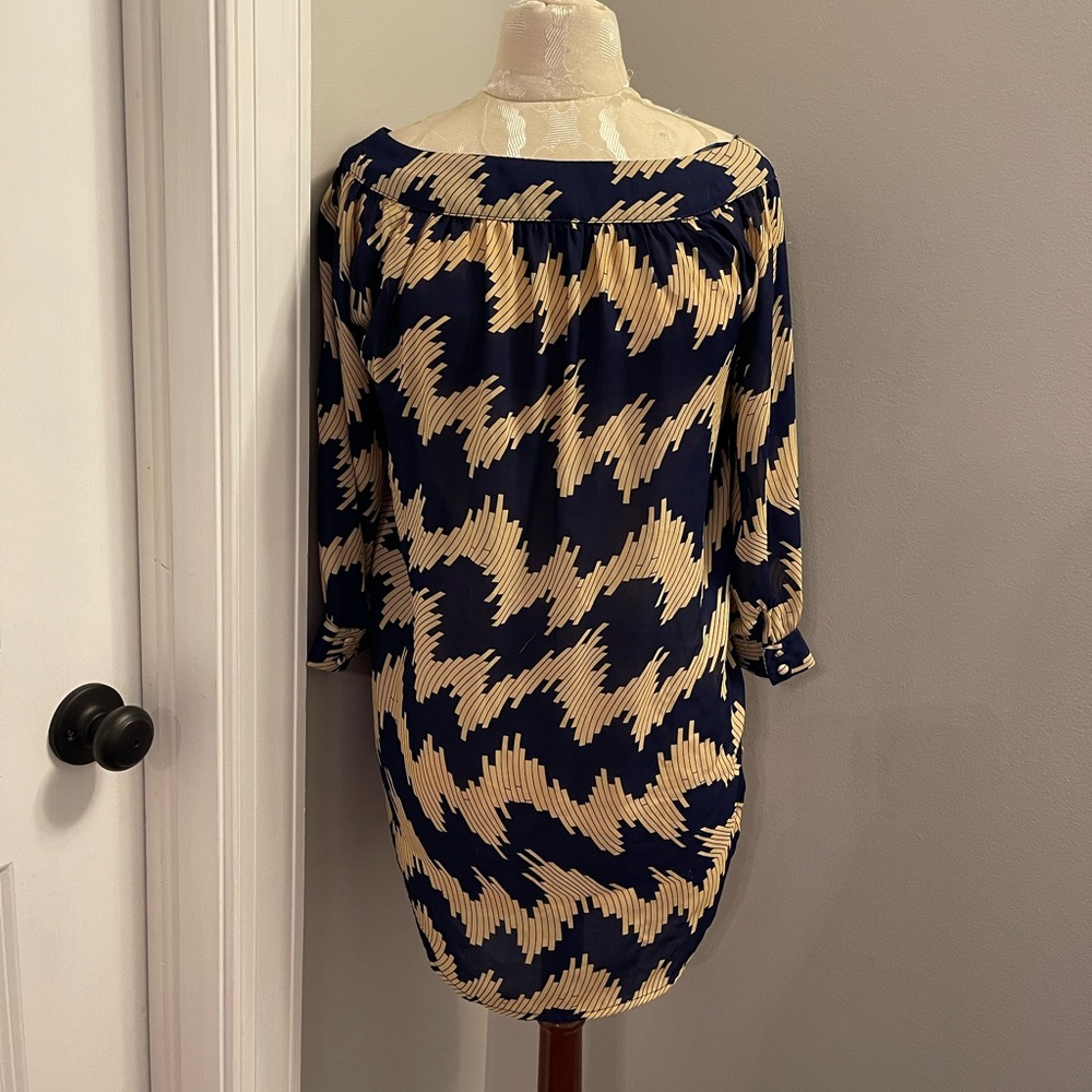 Depri Blouse. No size listed but I would say Small. Smoke free.